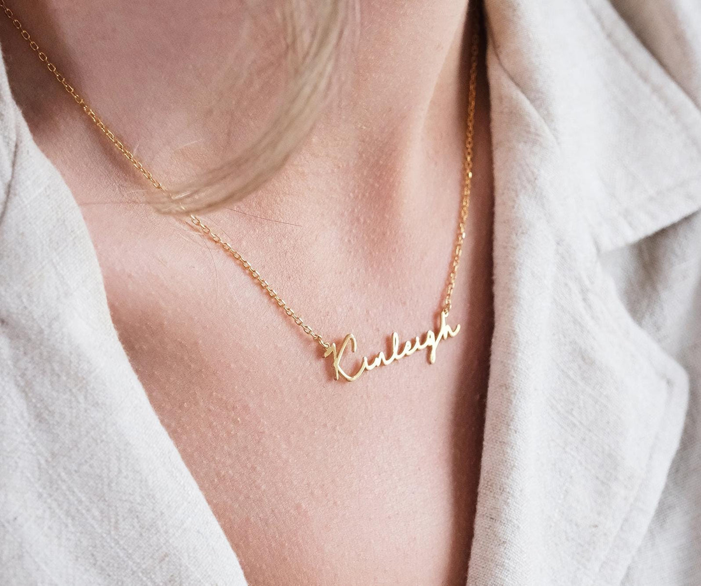 Present your loved ones with a unique gift through our customizable name necklaces. Available in gold, silver, and rose gold plating, these elegant and durable designs perfectly complement personal style. Add your name, and leave a lasting impression