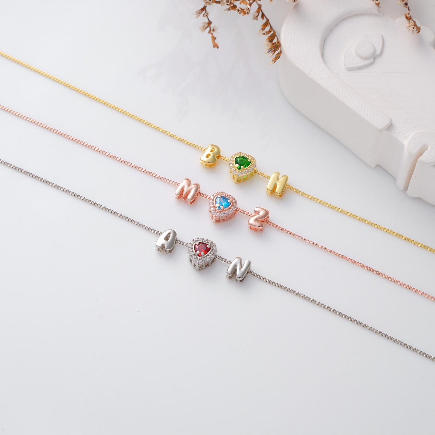 โจ Initial Charm Necklace with Heart CZ Pendant โ Personalized Jewelry โจ
A beautiful necklace featuring an initial letter charm paired with a sparkling heart CZ stone. Perfect for expressing love and adding a personal touch to your style.
๐ฏ Perfect For:
Birthdays, anniversaries, Valentine's Day, friendship gifts, or self-love jewelry.
๐ Product Details
โข Material: 925K Sterling Silver / 14K Solid Gold
โข Closure: Spring Ring
โข Charm Size: Approx. 8mm
โข Hypoallergenic & safe for sensitive skin