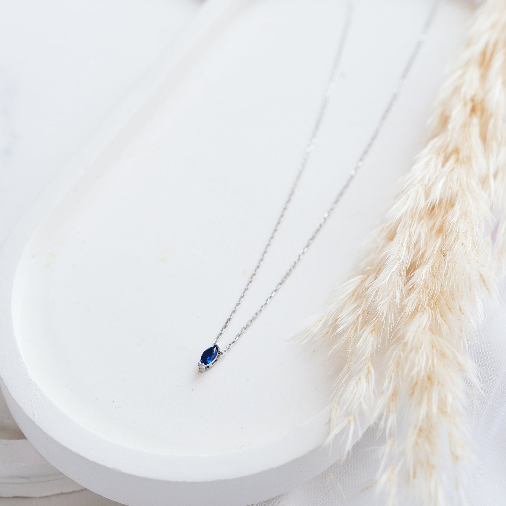 Create your own story with the customizable Stone Necklace. Choose from a variety of gemstones to reflect your personality or symbolize something special. this personalized piece is a unique way to express your individuality