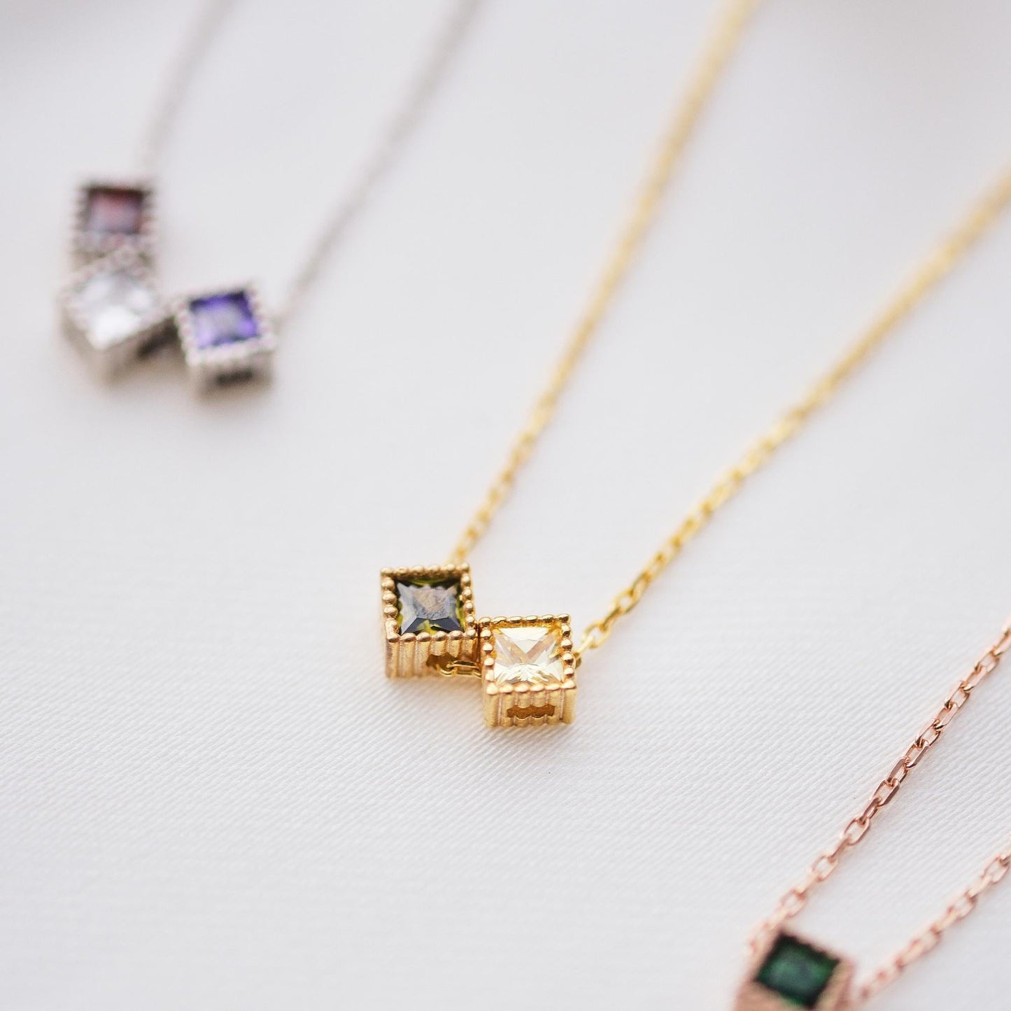 Dotted Elegance and Gemstone Sparkle: A Rose Gold, Gold, or Silver Necklace That Complements Every Look. Crafted with delicate dotted edges and a radiant gemstone centerpiece, this necklace brings a touch of luxury and versatility to any style.