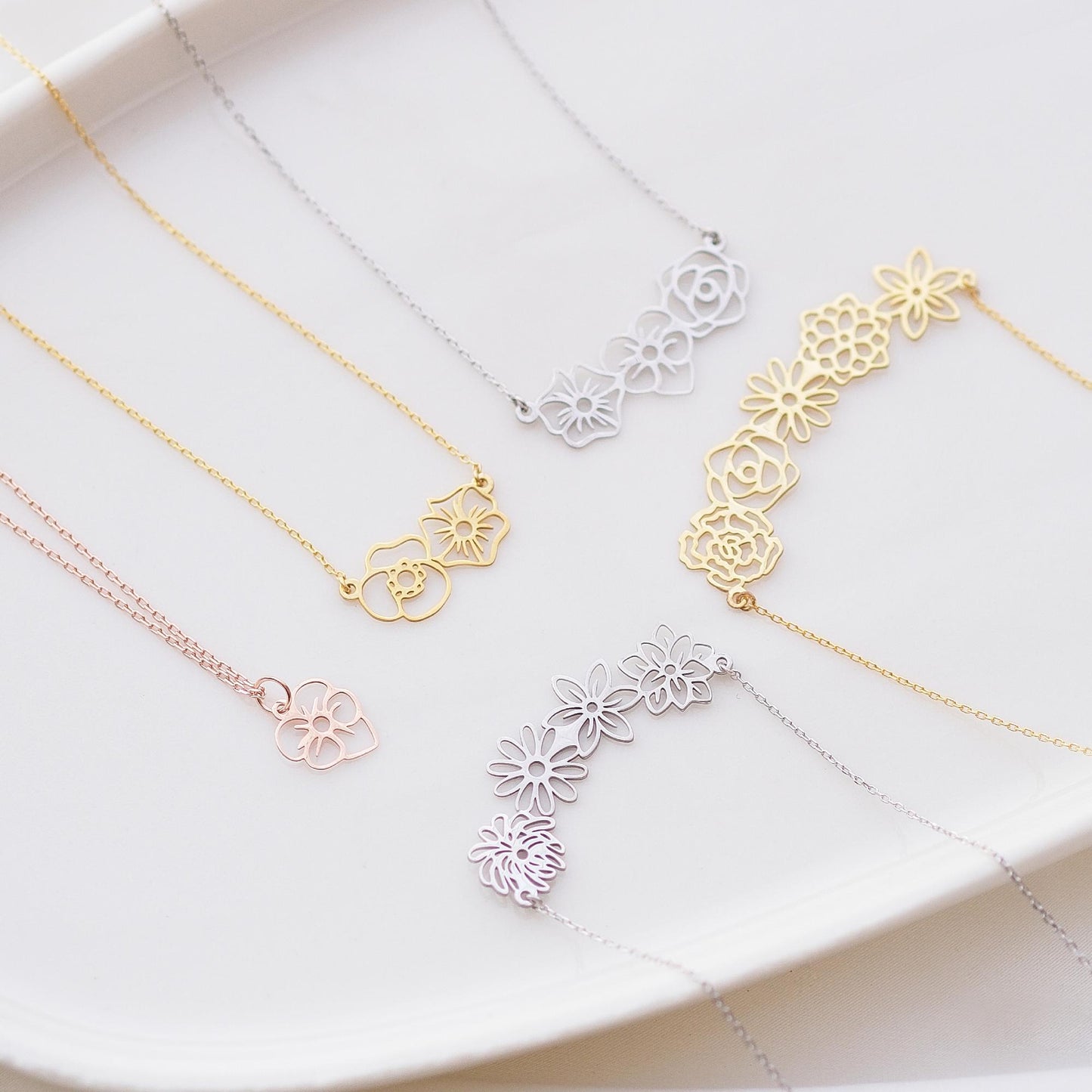 Wear Your Birth Month, Reflect Your Elegance.
Choose your unique flower necklace in gold, rose gold, or silver. Carry your story and style with you, every day. This combines the elegance and personal connection with a sales.
