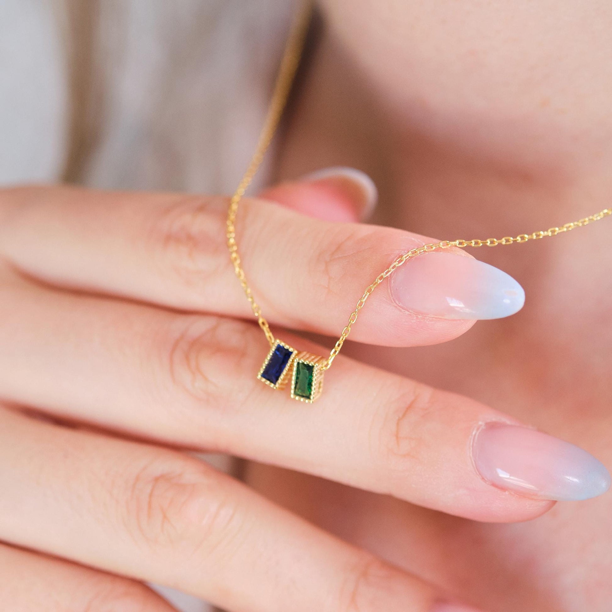 Personalize your style with our Rectangular Gemstone Necklaces. Choose a gemstone that represents you or holds special meaning. Available in gold, silver, and rose gold, these sleek, customizable pieces add a unique and elegant touch to any outfit