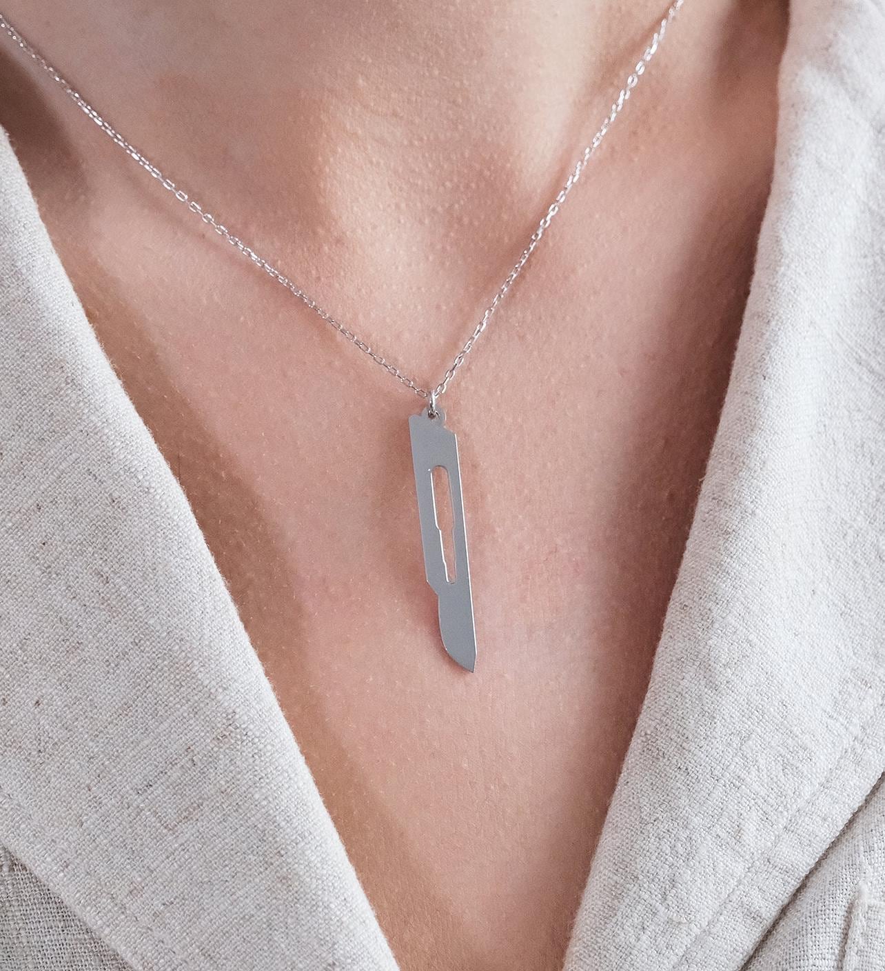 Make a bold statement with our customizable scalpel necklaces! Personalize with your name or a loved one’s, blending unique design with a sharp, modern edge—perfect for those who want to wear something truly distinctive