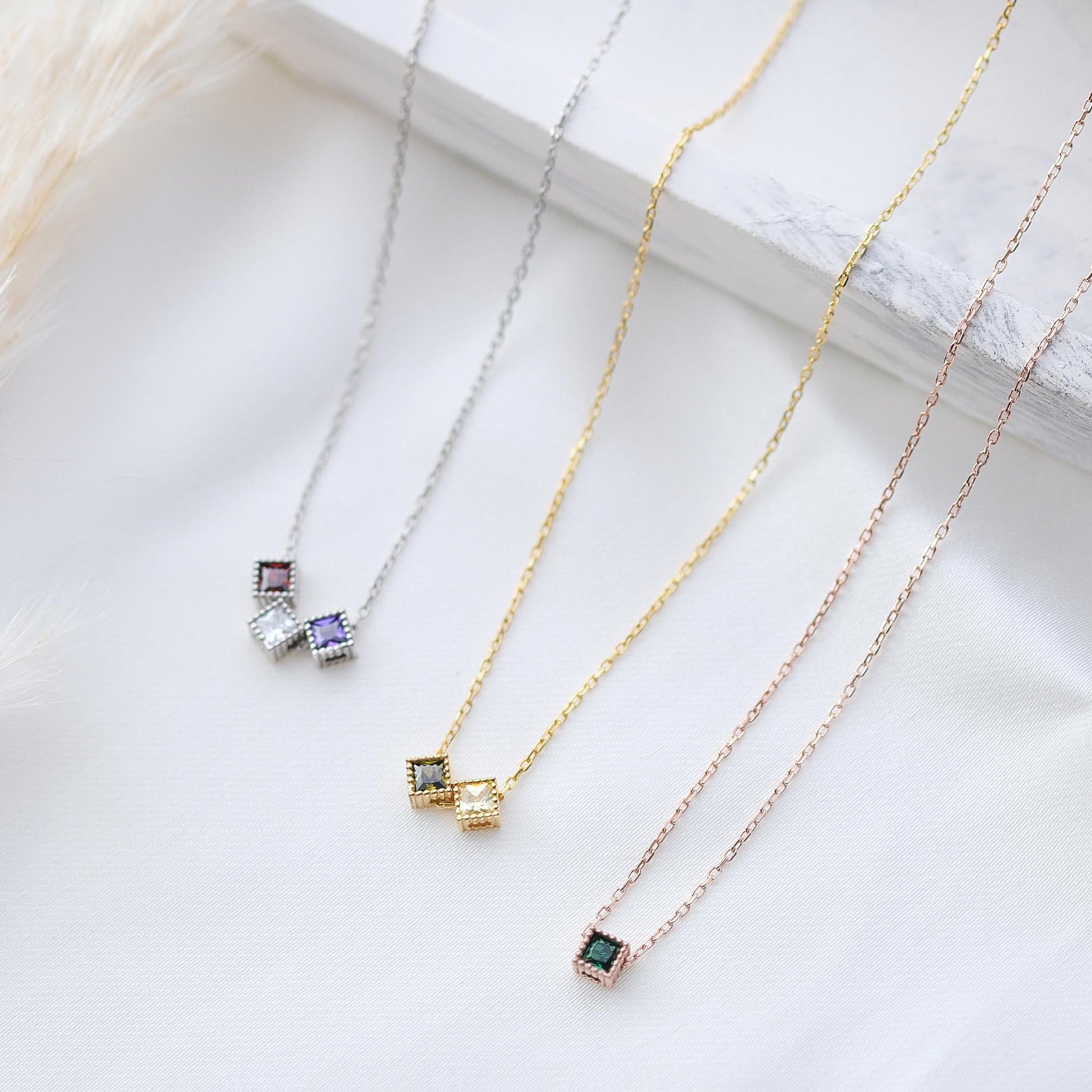 Dotted Elegance and Gemstone Sparkle: A Rose Gold, Gold, or Silver Necklace That Complements Every Look. Crafted with delicate dotted edges and a radiant gemstone centerpiece, this necklace brings a touch of luxury and versatility to any style.