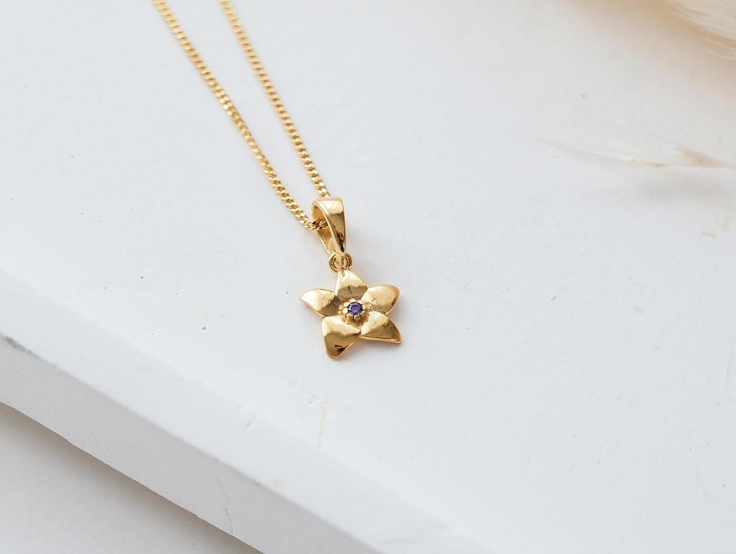 Celebrate every month with our 12-month birthstone flower necklaces! Each design blooms with the beauty of your birthstone, creating a personalized piece that reflects your story and style. A unique and meaningful gift for yourself or a loved one