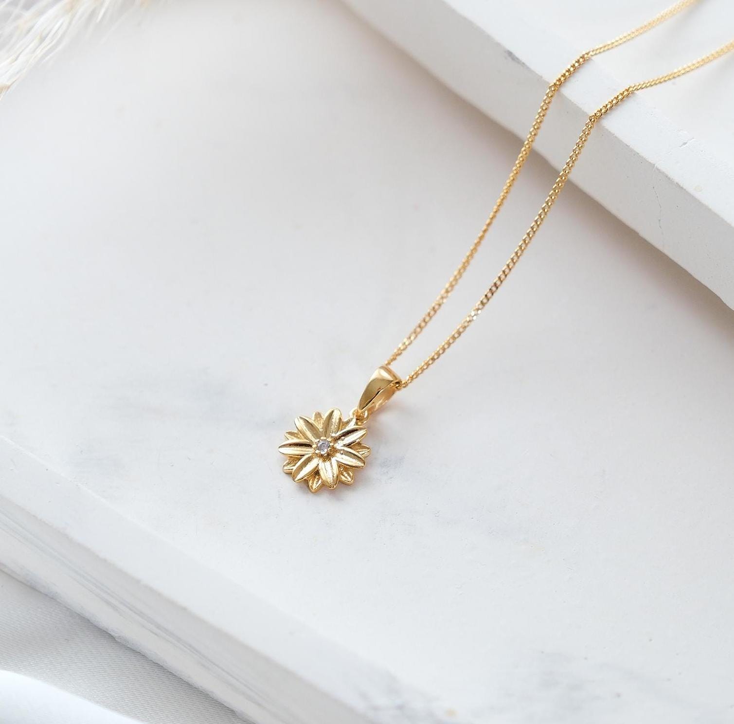 Celebrate every month with our 12-month birthstone flower necklaces! Each design blooms with the beauty of your birthstone, creating a personalized piece that reflects your story and style. A unique and meaningful gift for yourself or a loved one