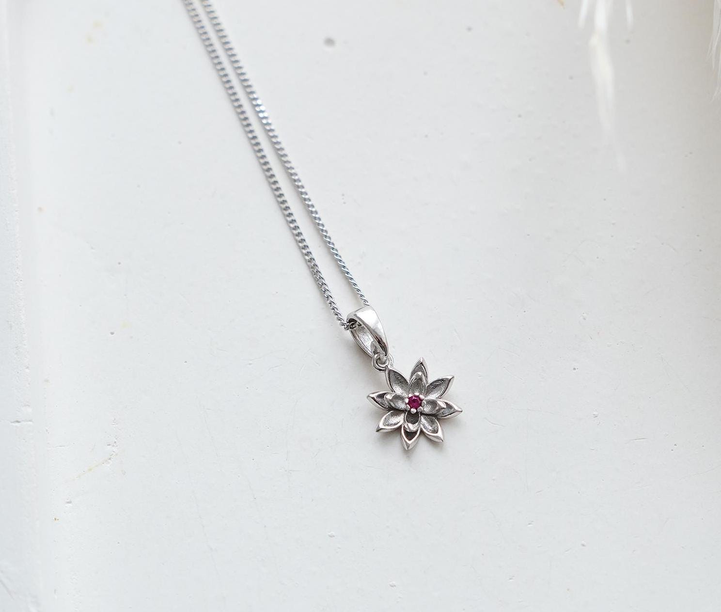 Celebrate every month with our 12-month birthstone flower necklaces! Each design blooms with the beauty of your birthstone, creating a personalized piece that reflects your story and style. A unique and meaningful gift for yourself or a loved one