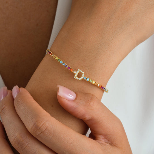 Material: 925 Sterling Silver or 14K Solid Gold
Finish: High-polish
 Stone: AAA+ Cubic Zirconia
Charm: Single initial letter (A–Z)
Length: Adjustable (5&quot;-9&quot;)
Hypoallergenic & nickel-free
Handmade with precision
Personalized Gifts  Birthday  Bridesmaids Graduation  Dainty Luxury Lovers – Gift for Her  Everyday Elegance Elegant gift box
Ready for gifting with optional message
Processing time: 2–3 business days
Ships from Turkey (for EU orders)
USA: 2–5 business days
Europe: 1–3 business days