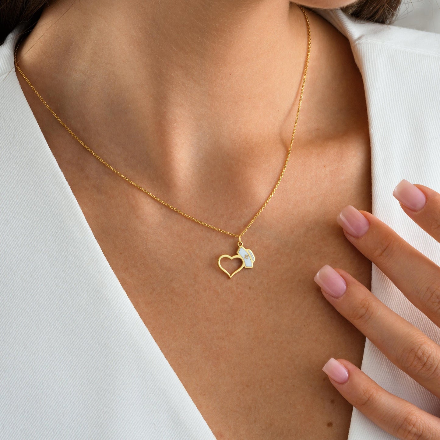 925K Sterling Silver 14K Solid Gold Finish High polish
Pendant Open heart with white enamel nurse cap Chain Length Adjustable 16&quot;  2&quot; extender Spring ring lobster clasp
Nurses Doctor Graduation gifts  White coat ceremony  Healthcare workers Nurse appreciation  Med school students
Elegant gift box Ready for gifting  ideal for birthdays graduation appreciation
Handmade to order in US
Processing 2 3 business day Express delivery US 2 5 business day 1 3 business days
For EUROPE shipped from TURKEY