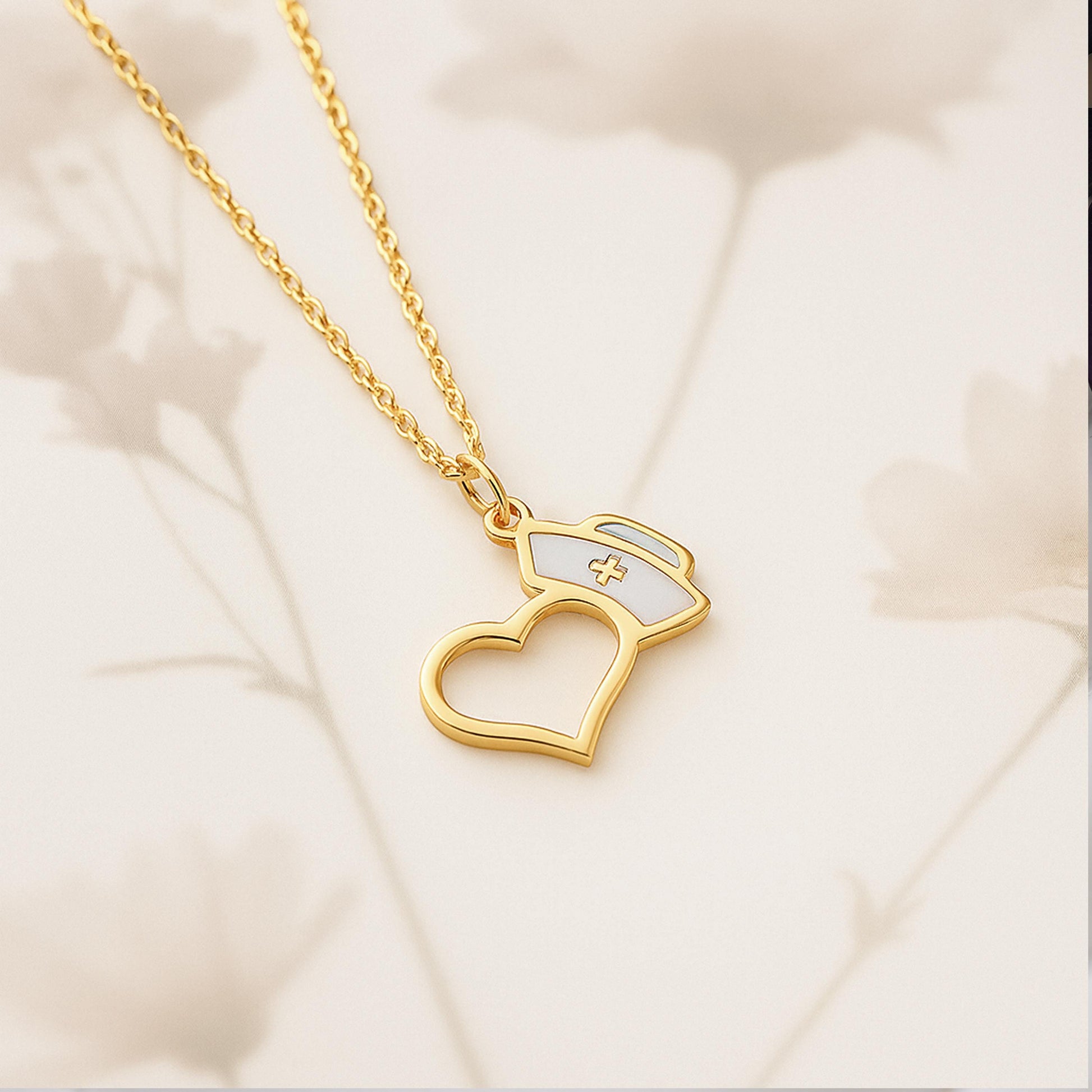 925K Sterling Silver 14K Solid Gold Finish High polish
Pendant Open heart with white enamel nurse cap Chain Length Adjustable 16&quot;  2&quot; extender Spring ring lobster clasp
Nurses Doctor Graduation gifts  White coat ceremony  Healthcare workers Nurse appreciation  Med school students
Elegant gift box Ready for gifting  ideal for birthdays graduation appreciation
Handmade to order in US
Processing 2 3 business day Express delivery US 2 5 business day 1 3 business days
For EUROPE shipped from TURKEY