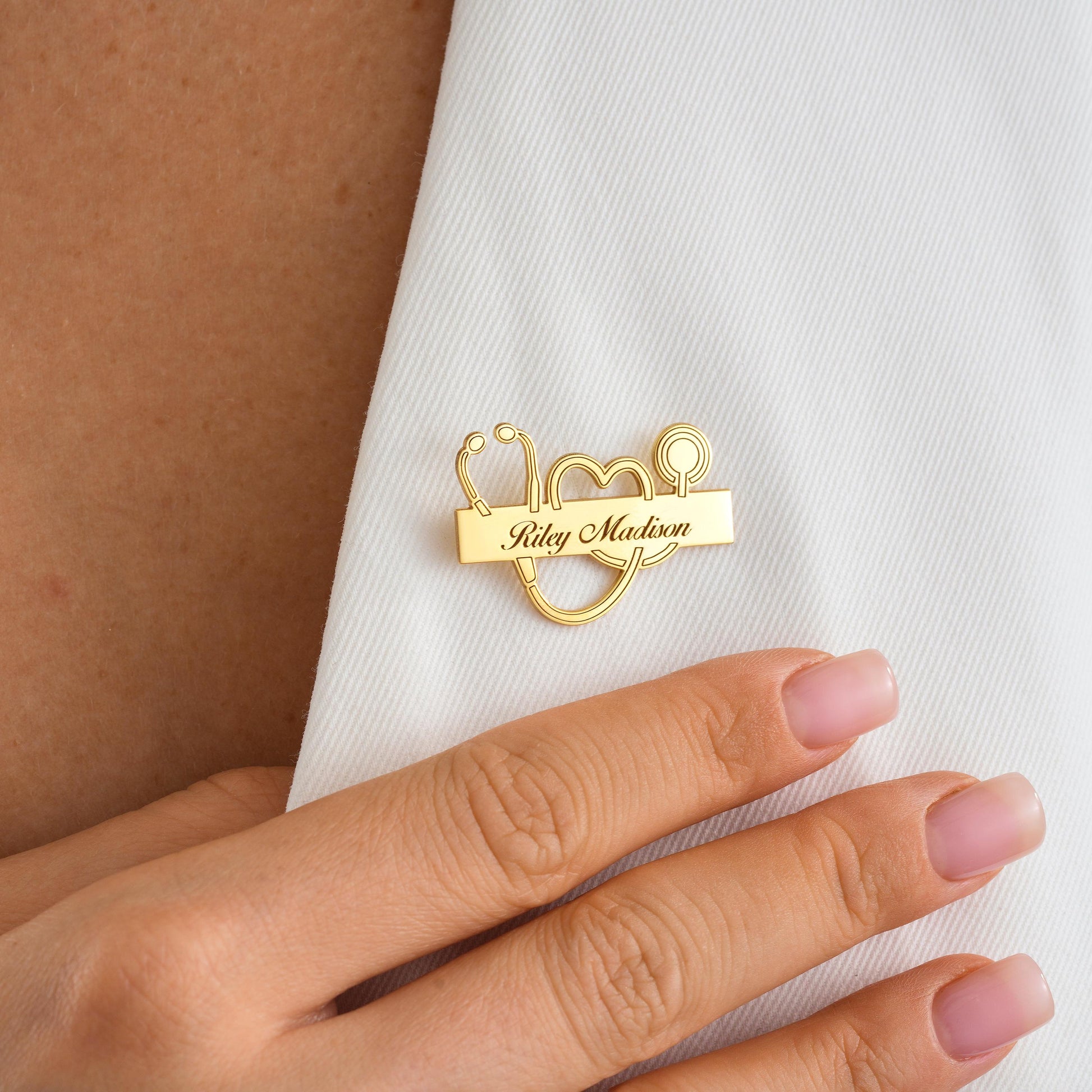 Details:
• Material: Solid Gold Silver Plating
• Finish: High-polish
• Personalization: Custom name engraving 
• Closure: Butterfly clutch back
• Size: Approx. 1.5 inches wide
• Packaging: Gift-ready jewelry box
Perfect For:
Nurse & Doctor Appreciation
Graduation Gift
White Coat Ceremonies
Personalized Uniform Badge
Medical School Students
Shipping:
• Handmade to order in US
• Processing time: 2–3 business days
• Express delivery available:
 ▫ USA: 2–5 business days
 ▫ Europe: 1–3 business days