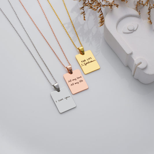 Personalized Engraved Plate Pendant Necklace – Custom Message Jewelry ✨

A timeless necklace designed for your most meaningful words. Engrave your favorite quote, names, or a special date for a truly personal touch.

💛 Product Details
• Material: 925K Sterling Silver / 14K Solid Gold
• Closure: Spring Ring
• Pendant Size: Approx. 15×20mm
• Sold as: Pendant with chain included
• Hypoallergenic & safe for sensitive skin