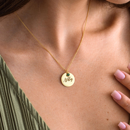Personalized Circle Plate Name Pendant Necklace with Birthstone
A stylish and meaningful necklace featuring a round plate engraved with your name and paired with a sparkling birthstone charm. Perfect as a daily accessory or a thoughtful gift for someone special 
Material: 925K Sterling Silver / 14K Solid Gold  Spring Ring  
Pendant Size: Approx. 15mm diameter  
Birthstone: Synthetic stone representing birth month  Sold as Pendant with chain included  
Hypoallergenic & safe for sensitive skin