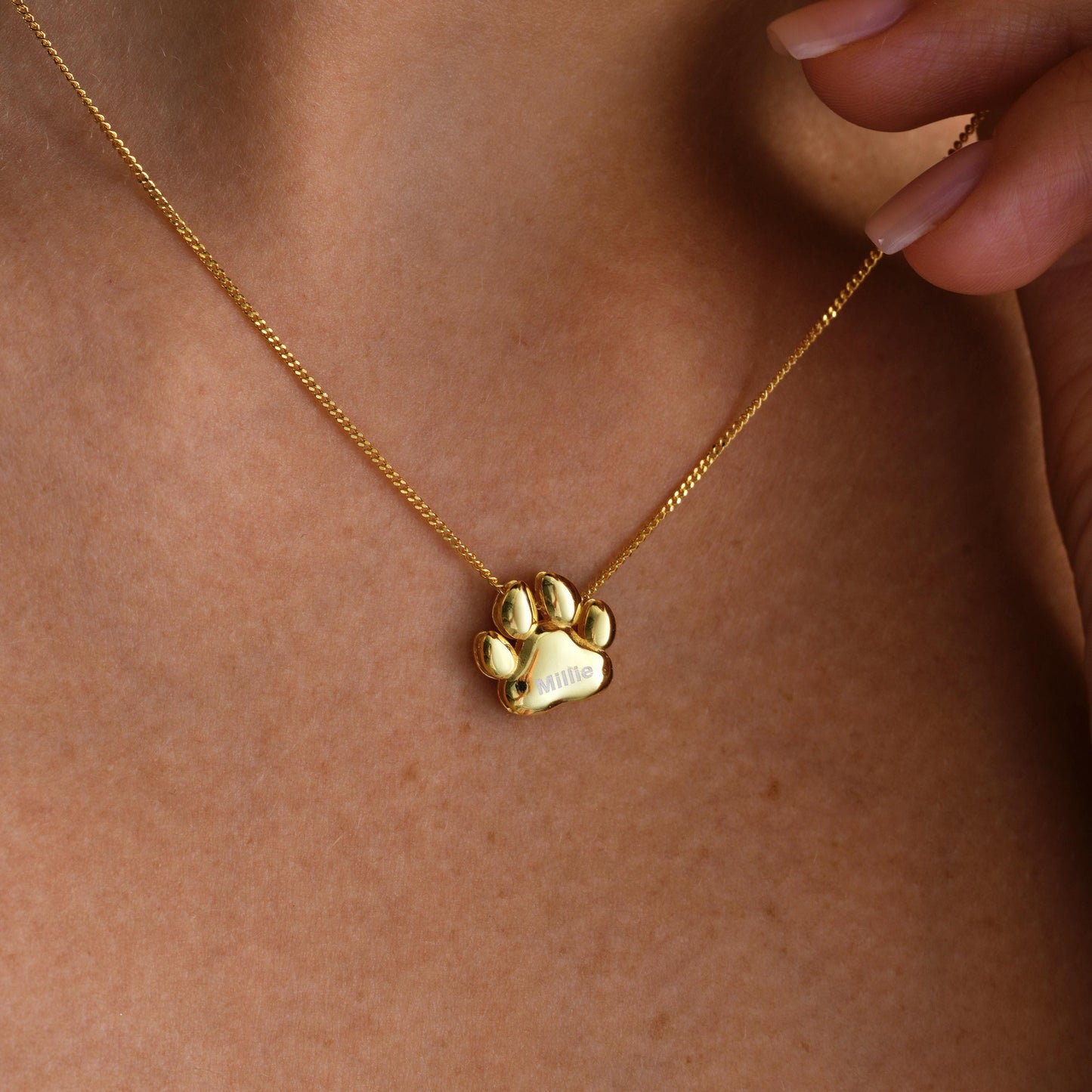 Custom Paw Print Pendant Necklace – Personalized Pet Memorial Jewelry ✨  

A beautiful and meaningful necklace featuring a 3D paw print charm, perfect for honoring your beloved pet or gifting to an animal lover. A timeless keepsake to cherish forever.

💛 Product Details  
• Material: 925K Sterling Silver / 14K Solid Gold  
• Closure: Spring Ring  
• Pendant Size: Approx. 10mm  
• Sold as: Pendant with chain included  
• Hypoallergenic & safe for sensitive skin