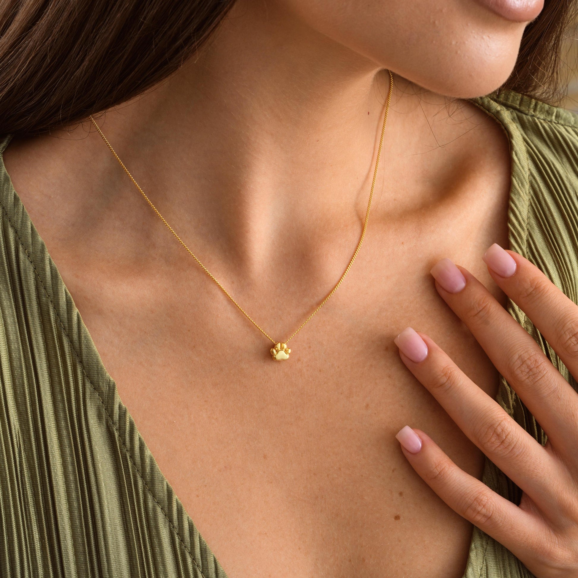 Custom Paw Print Pendant Necklace – Personalized Pet Memorial Jewelry ✨  

A beautiful and meaningful necklace featuring a 3D paw print charm, perfect for honoring your beloved pet or gifting to an animal lover. A timeless keepsake to cherish forever.

💛 Product Details  
• Material: 925K Sterling Silver / 14K Solid Gold  
• Closure: Spring Ring  
• Pendant Size: Approx. 10mm  
• Sold as: Pendant with chain included  
• Hypoallergenic & safe for sensitive skin