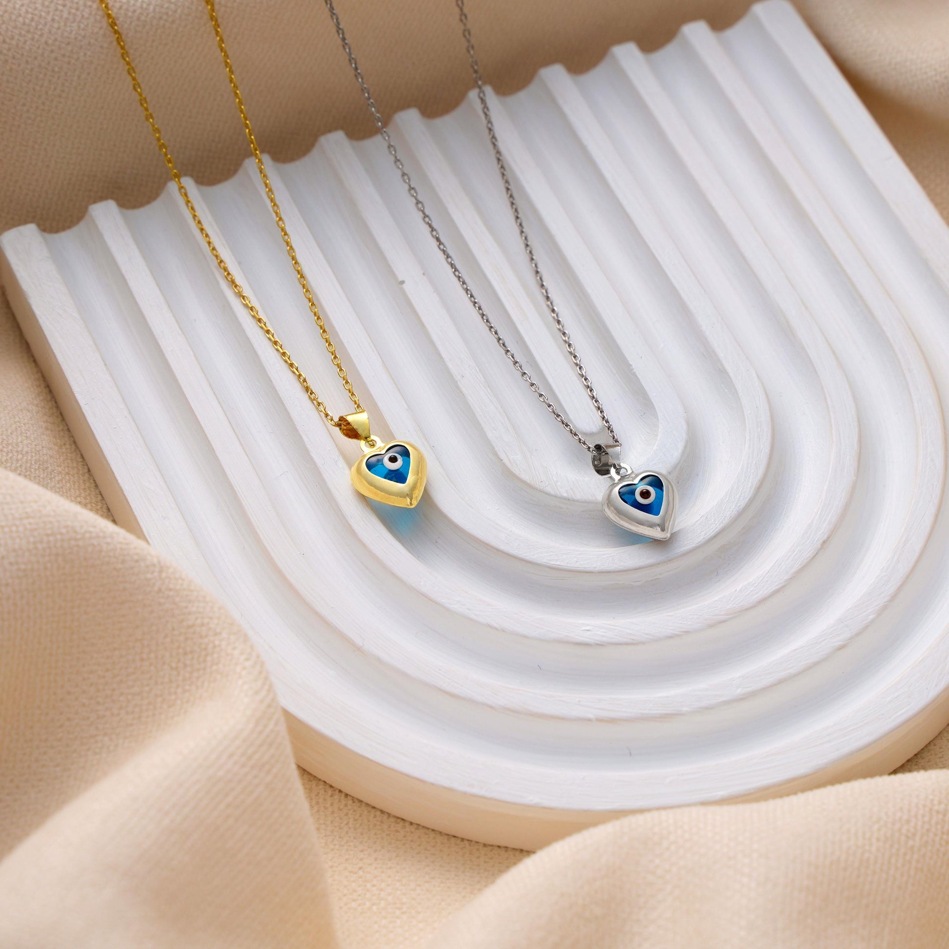 Gold Heart Evil Eye Necklace – Protective Amulet Jewelry
A stunning heart-shaped pendant featuring the traditional evil eye design for protection and good fortune. Perfect as a meaningful gift or a stylish personal talisman.
Protection gifts, good luck charms, birthdays, anniversaries, or personal wear.
• Material: 925K Sterling Silver / 14K Solid Gold
• Closure: Spring Ring
• Pendant Size: Approx. 10mm
• Sold as: Pendant with chain included
• Hypoallergenic & safe for sensitive skin