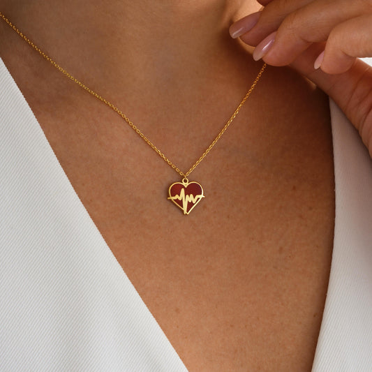 Enamel Heart Heartbeat Necklace – Medical Jewelry Gift 
A striking necklace featuring a heart-shaped pendant with a heartbeat line design in colorful enamel. A perfect gift for nurses, doctors, and medical professionals or a symbolic piece for those passionate about healthcare.
Medical workers, nurse graduation gifts, doctor appreciation gifts, or healthcare lovers.
• Material: 925K Sterling Silver / 14K Solid Gold
Closure Spring Ring
Size: Approx. 15mm
Hypoallergenic & safe for sensitive skin