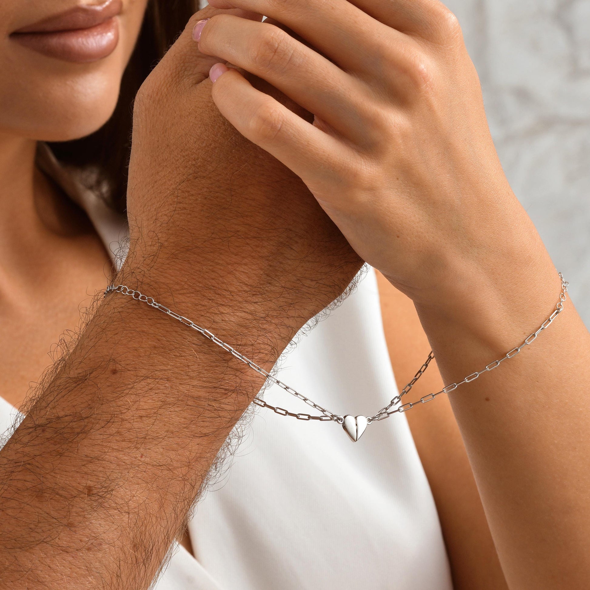 Material 925 Sterling Silver  14K Solid Gold  Rose Gold Silver
Finish High polish
Design Magnetic heart that forms a whole when placed together
Chain Paperclip-style chain
Adjustable 5&quot; 9&quot;
Closure Lobster clasp
Hypoallergenic nickel free
Handmade 
Couple Bracelets  Long-Distance Lovers Best Friends  Anniversary Gifts  Valentine Day
2 individual bracelets 1 set
gift packaging
Ready for gifting with optional note card
Processing time 2 3 business days
USA 2 5 business day
Europe 1 3 business day