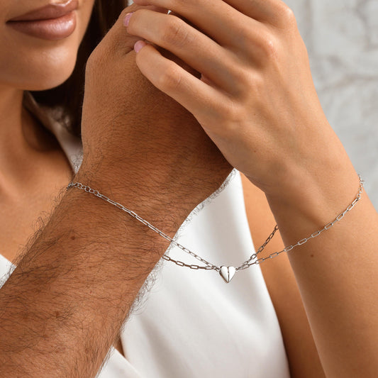 Material 925 Sterling Silver  14K Solid Gold  Rose Gold Silver
Finish High polish
Design Magnetic heart that forms a whole when placed together
Chain Paperclip-style chain
Adjustable 5&quot; 9&quot;
Closure Lobster clasp
Hypoallergenic nickel free
Handmade 
Couple Bracelets  Long-Distance Lovers Best Friends  Anniversary Gifts  Valentine Day
2 individual bracelets 1 set
gift packaging
Ready for gifting with optional note card
Processing time 2 3 business days
USA 2 5 business day
Europe 1 3 business day