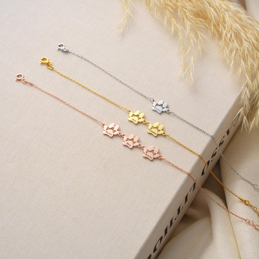 925 Sterling Silver or 14K Solid Gold
High-polish
Double paw prints with optional name engraving
 Fine cable chain
Adjustable 5&quot;-9&quot; Lobster clasp
Hypoallergenic & nickel-free
• Handmade with care
Dog Moms  Cat Lovers  Pet Memorial Best Friend Gifts  Personalized Jewelry  Everyday Animal Style
 Elegant gift box
• Ready for gifting with optional message card
• Processing time: 2–3 business days
• Ships from Turkey (for EU buyers)
• USA: 2–5 business days
• Europe: 1–3 business days