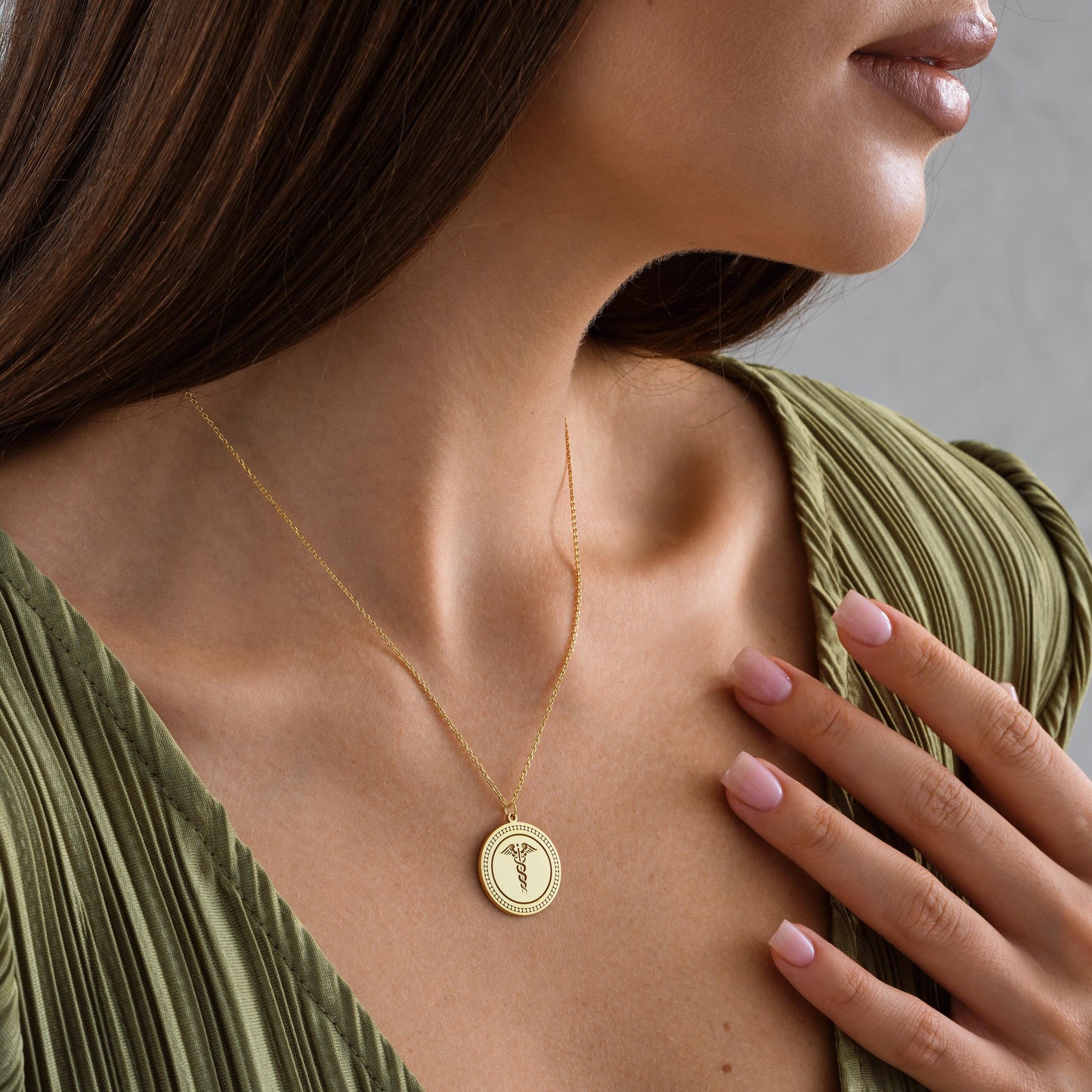 Engraved Caduceus Pendant – Medical Symbol Necklace
A meaningful necklace featuring the caduceus symbol, representing health, medicine, and healing. Perfect gift for doctors, nurses, and medical students.
• Material: 925K Sterling Silver / 14K Solid Gold
• Closure: Spring Ring
• Pendant Size: Approx. 20mm diameter
• Sold as: Pendant with chain included
• Hypoallergenic & safe for sensitive skin
Doctor Gift – Nurse Gift – Medical Student – Graduation – Everyday Wear – Healthcare Workers