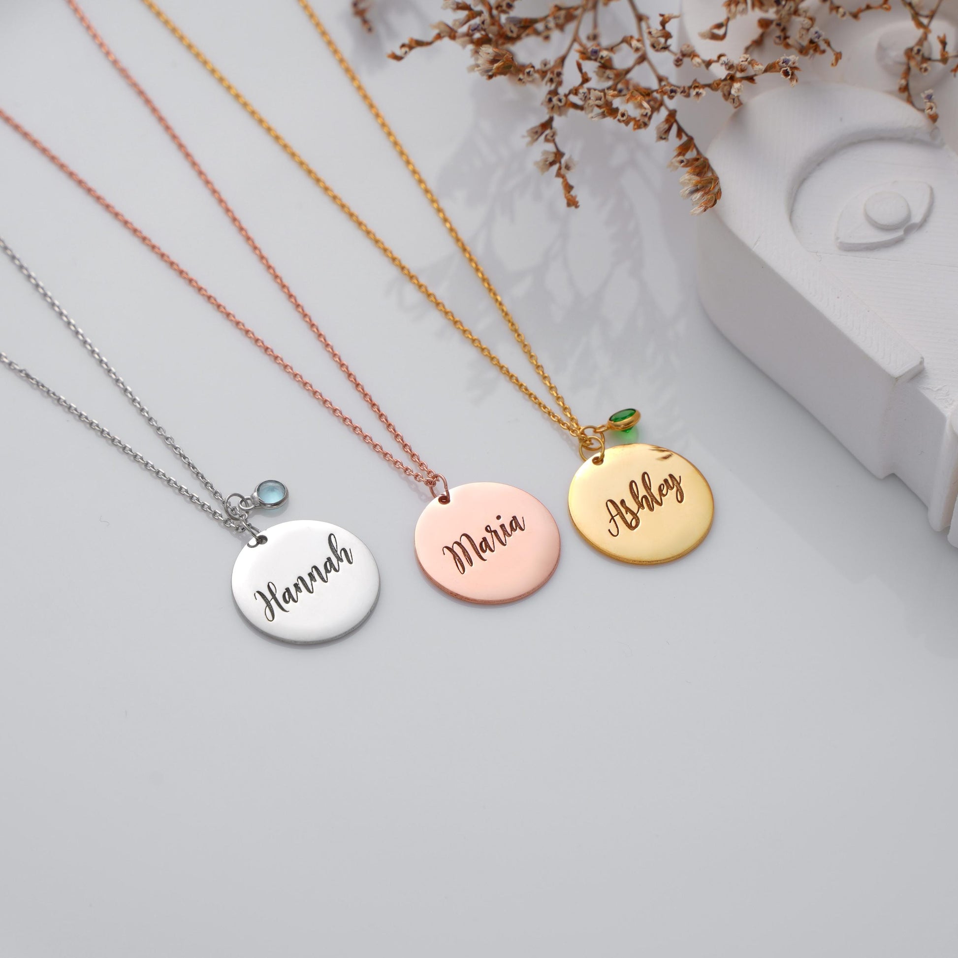 Personalized Circle Plate Name Pendant Necklace with Birthstone
A stylish and meaningful necklace featuring a round plate engraved with your name and paired with a sparkling birthstone charm. Perfect as a daily accessory or a thoughtful gift for someone special 
Material: 925K Sterling Silver / 14K Solid Gold  Spring Ring  
Pendant Size: Approx. 15mm diameter  
Birthstone: Synthetic stone representing birth month  Sold as Pendant with chain included  
Hypoallergenic & safe for sensitive skin