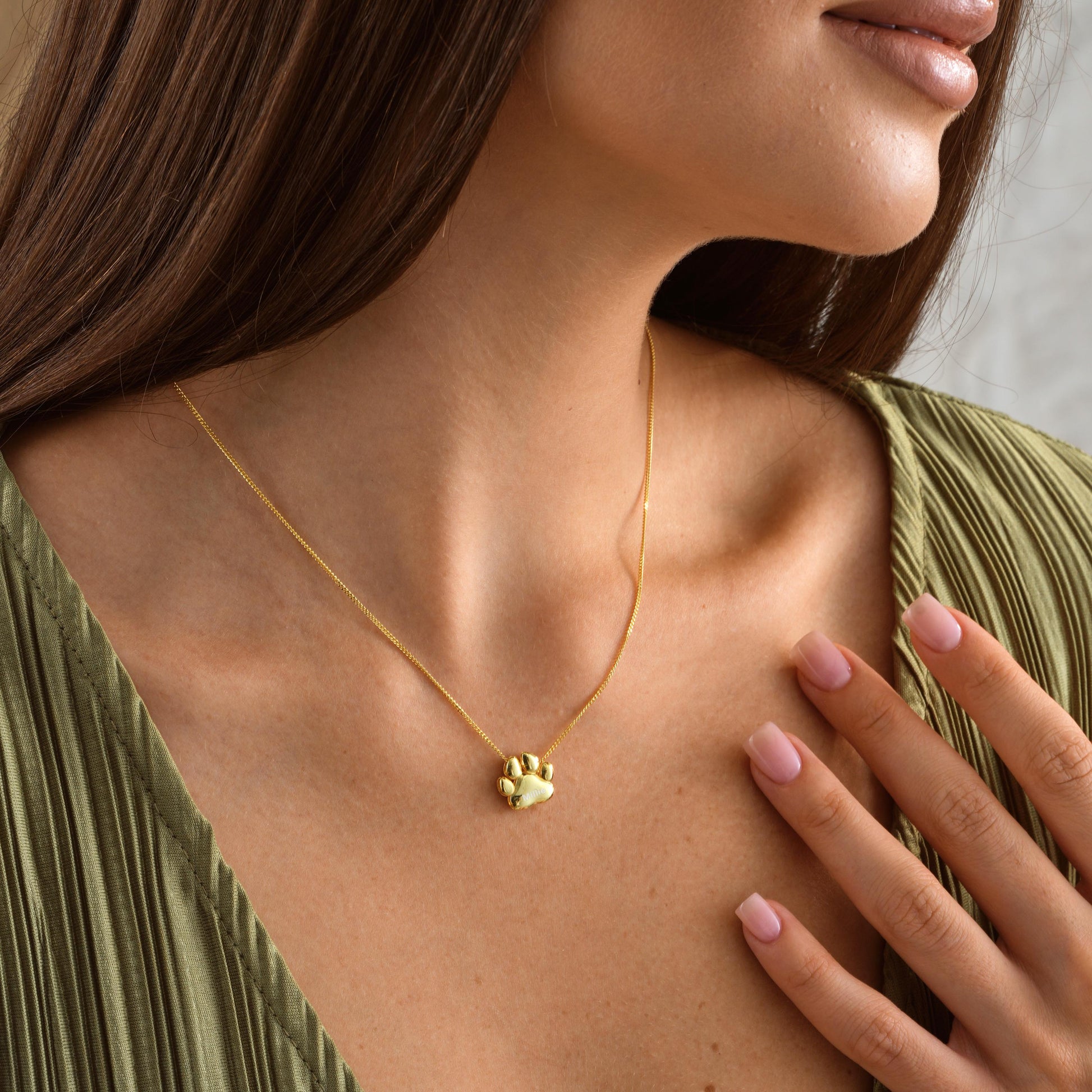 Custom Paw Print Pendant Necklace – Personalized Pet Memorial Jewelry ✨  

A beautiful and meaningful necklace featuring a 3D paw print charm, perfect for honoring your beloved pet or gifting to an animal lover. A timeless keepsake to cherish forever.

💛 Product Details  
• Material: 925K Sterling Silver / 14K Solid Gold  
• Closure: Spring Ring  
• Pendant Size: Approx. 10mm  
• Sold as: Pendant with chain included  
• Hypoallergenic & safe for sensitive skin