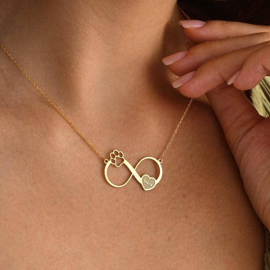 ✨ Custom Eternity Paw Necklace – Personalized Pet Name Pendant ✨  

A unique infinity design blending a paw print and a heart, symbolizing endless love for your furry friend. Perfect as a gift for pet lovers or a meaningful keepsake for yourself.

💛 Product Details  
• Material: 925K Sterling Silver / 14K Solid Gold  
• Closure: Spring Ring  
• Pendant Size: Approx. 25mm  
• Sold as: Pendant with chain included  
• Hypoallergenic & safe for sensitive skin