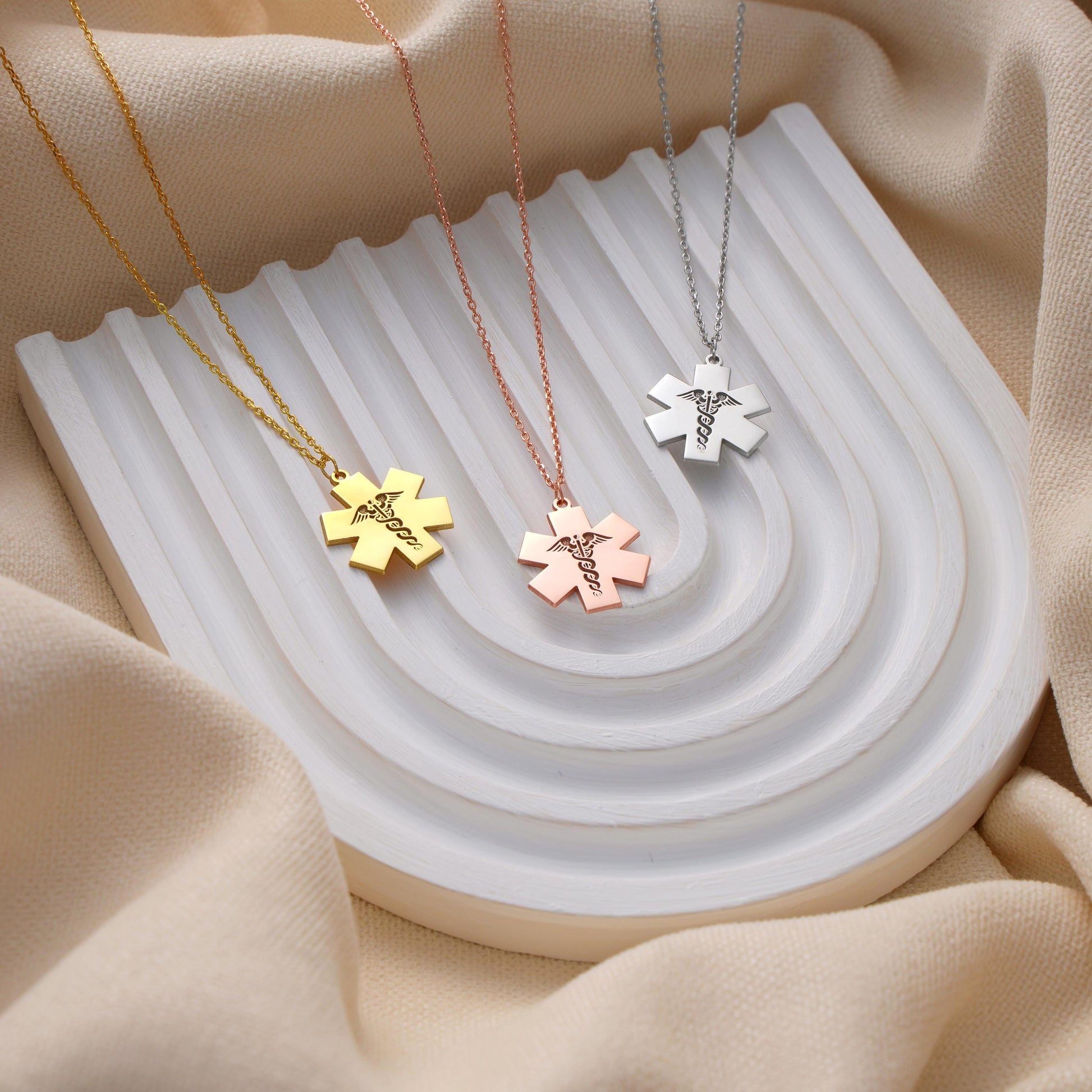✨ Star of Life Necklace – Engraved Caduceus Pendant ✨  

A meaningful and elegant necklace featuring the Star of Life medical symbol with an engraved caduceus sign. Perfect for paramedics, doctors, nurses, or as a gift for someone in the medical field.

💛 Product Details  
• Material: 925K Sterling Silver / 14K Solid Gold  
• Closure: Spring Ring  
• Pendant Size: Approx. 20mm  
• Sold as: Pendant with chain included  
• Hypoallergenic & safe for sensitive skin