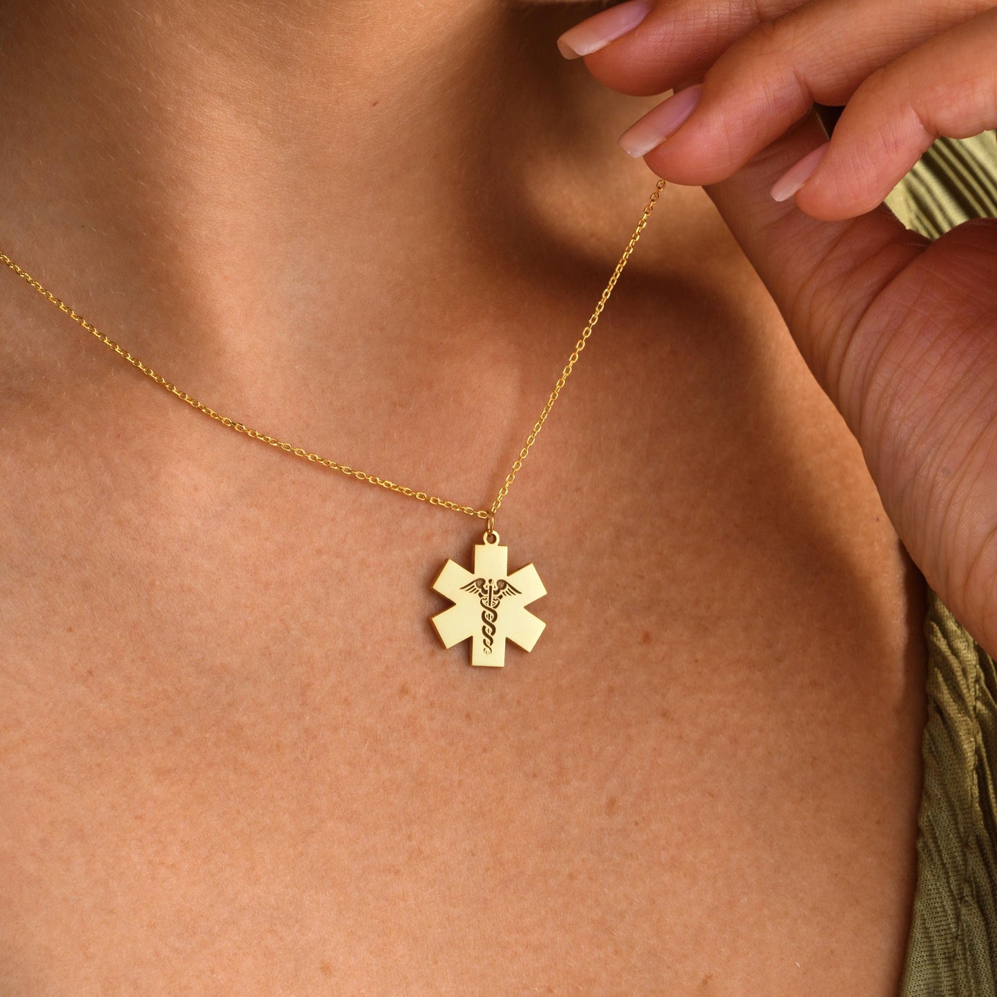 ✨ Star of Life Necklace – Engraved Caduceus Pendant ✨  

A meaningful and elegant necklace featuring the Star of Life medical symbol with an engraved caduceus sign. Perfect for paramedics, doctors, nurses, or as a gift for someone in the medical field.

💛 Product Details  
• Material: 925K Sterling Silver / 14K Solid Gold  
• Closure: Spring Ring  
• Pendant Size: Approx. 20mm  
• Sold as: Pendant with chain included  
• Hypoallergenic & safe for sensitive skin