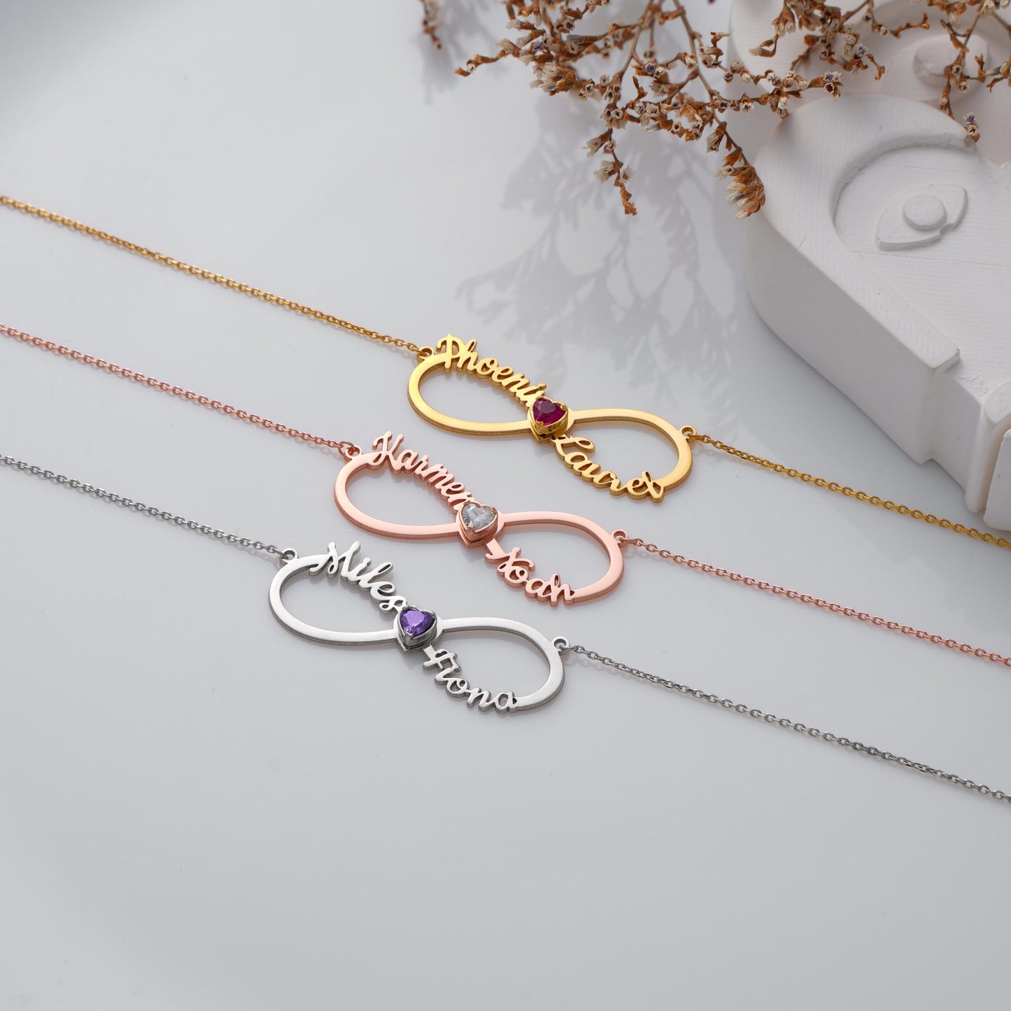 ✨ Custom Infinity Name Necklace – Heart Birthstone Pendant ✨

A timeless infinity necklace featuring two names and a sparkling heart-shaped birthstone in the center. Perfect for celebrating love, friendship, or family bonds with a personalized touch.

💛 Product Details
• Material: 925K Sterling Silver / 14K Solid Gold
• Closure: Spring Ring
• Pendant Size: Approx. 40mm
• Sold as: Pendant with chain included
• Hypoallergenic & safe for sensitive skin