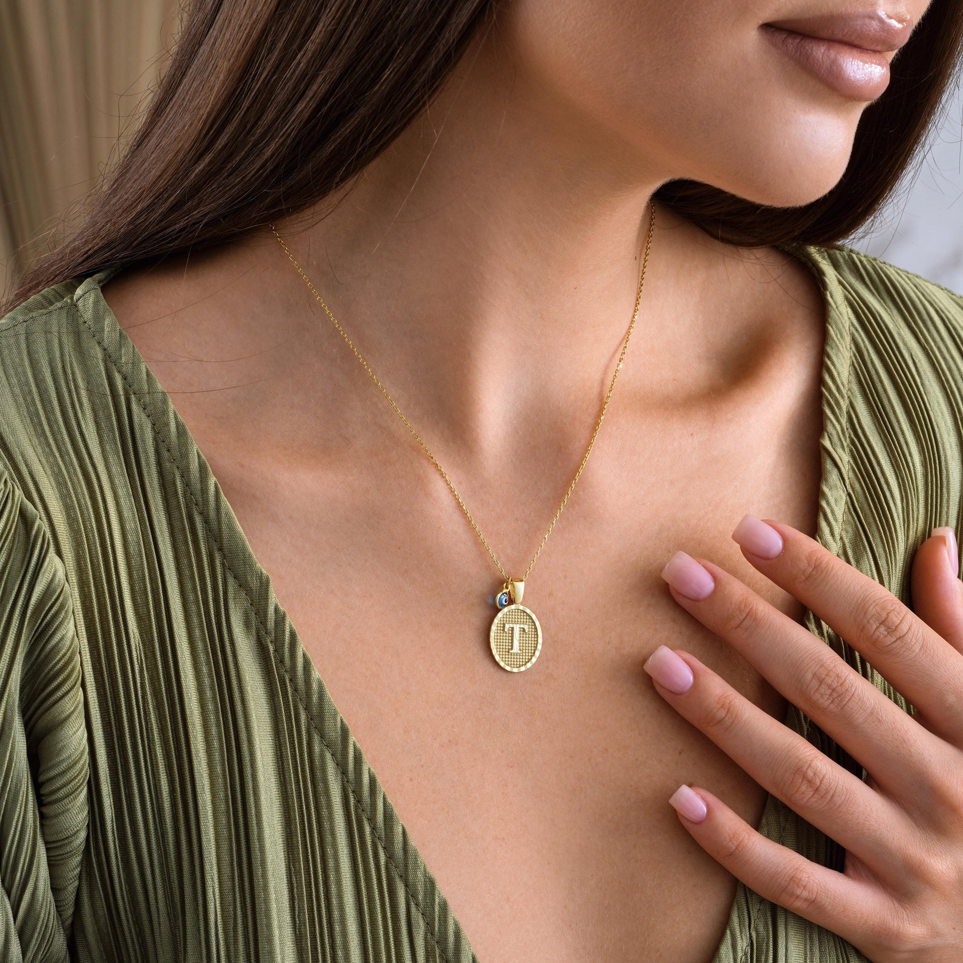 ✨ Initial Pendant Necklace with Evil Eye Charm – Personalized Jewelry ✨

A stunning necklace featuring an elegant initial pendant paired with a protective evil eye charm. Perfect as a meaningful gift or stylish everyday accessory.

🎯 Perfect For:
Birthdays, anniversaries, good luck gifts, protection jewelry, or self-love pieces.

💛 Product Details
• Material: 925K Sterling Silver / 14K Solid Gold
• Closure: Spring Ring
• Pendant Size: Approx. 15mm
• Hypoallergenic & safe for sensitive skin