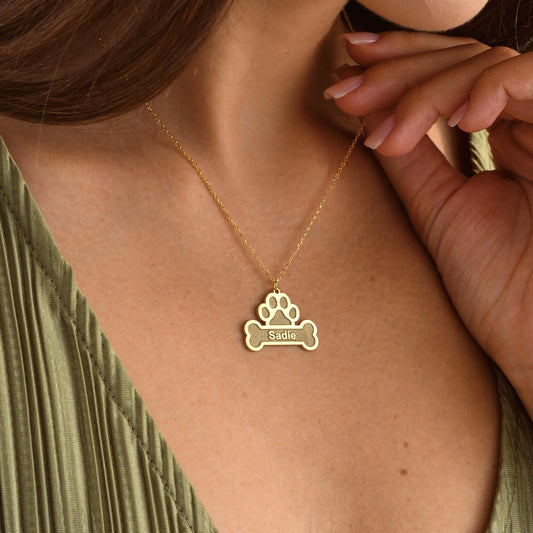 ✨ Custom Paw Name Necklace – Personalized Dog Bone Pendant ✨

A unique and heartfelt necklace featuring a paw print over a bone-shaped pendant engraved with your pet&#39;s name. Perfect for pet lovers, memorial keepsakes, or gifts for dog owners.

💛 Product Details
• Material: 925K Sterling Silver / 14K Solid Gold
• Closure: Spring Ring
• Pendant Size: Approx. 25mm
• Hypoallergenic & safe for sensitive skin