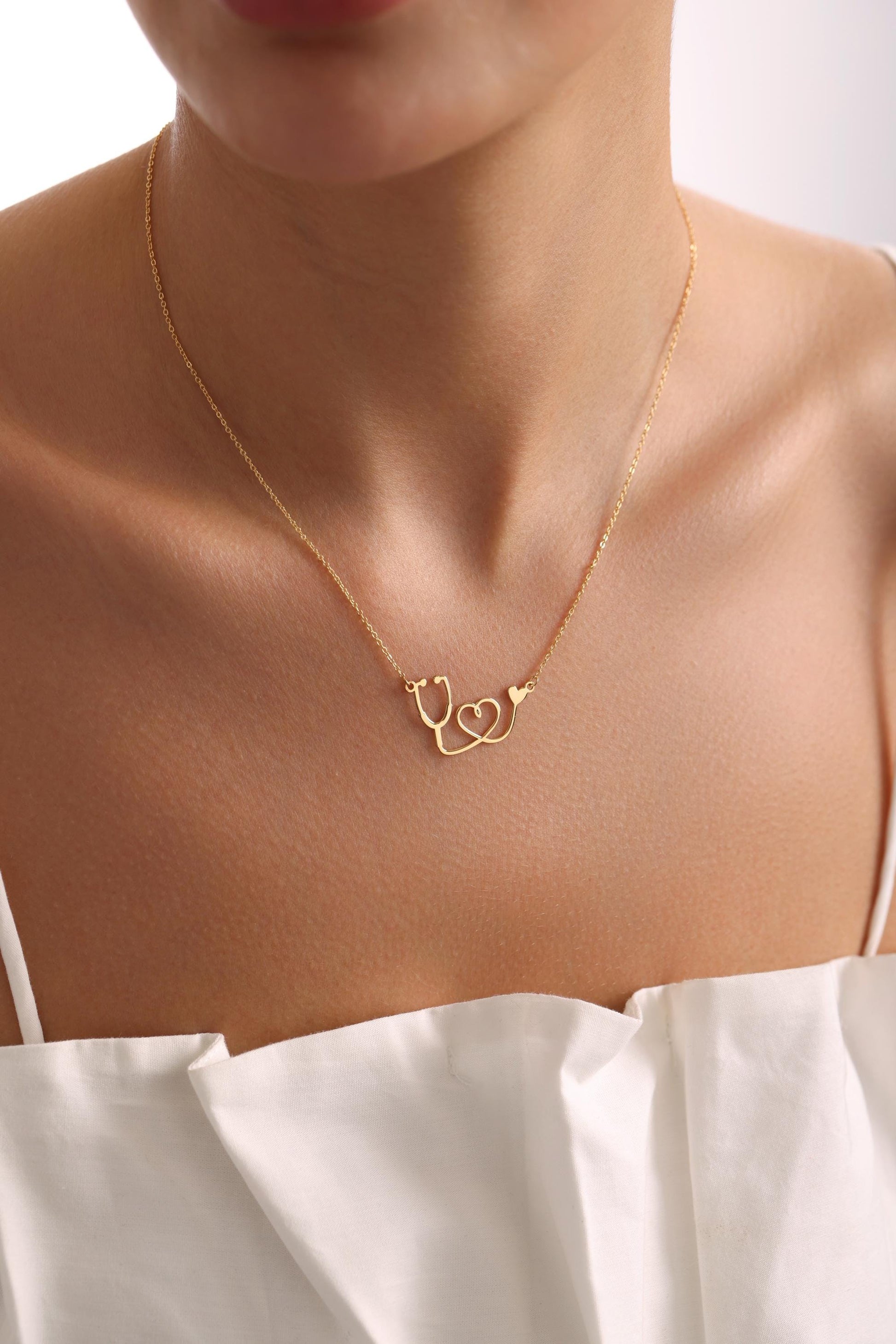 ECG and Statoscope Necklace Earring Combined Set for Health Workers Doctors Students Future Doctors Teenagers Former Health Employee Lovers
Woman
Mother
Worker
Nurse
Student
Couples
Girls
Unisex
Gift for 
Grandmothers
Happy
Romantic
Love
Surprise
Motivating
Loyalty
Remember
Fidelity
Memorial Days
Belonging
Special 
Date
Wear every
Anniversary 
Graduation 
Engagement Ceremony
Wedding
Birthdays
Causal Wear
Get Well Soon Gift
New Job
Personal Development
Promotion
Birthday
Routine
Beauty
New Baby
